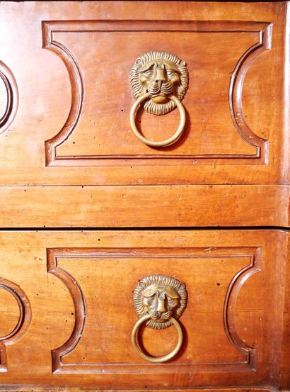 Molded walnut chest of drawers, opening with...