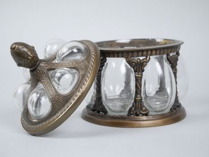 Oval blown-glass and metal cookie tin decorated...