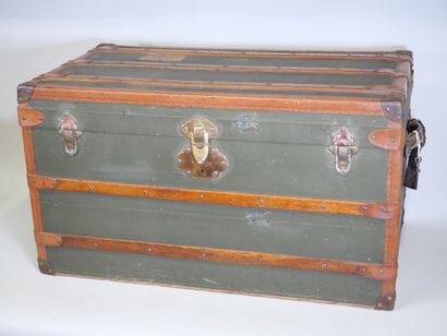 Travel trunk in studded leather, cardboard...