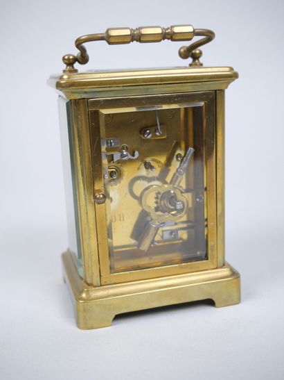 Officer's travel alarm clock with brass cage...