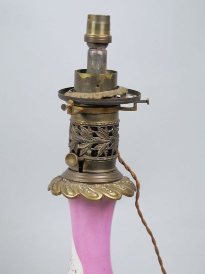 Pair of porcelain oil lamps with polychrome...