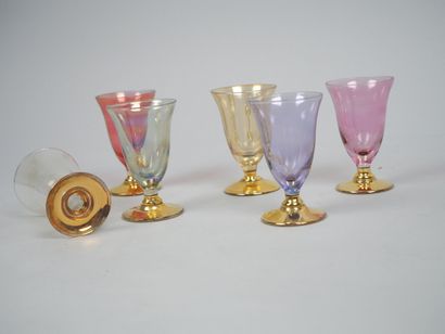 Part of a tinted and gilded glass service...