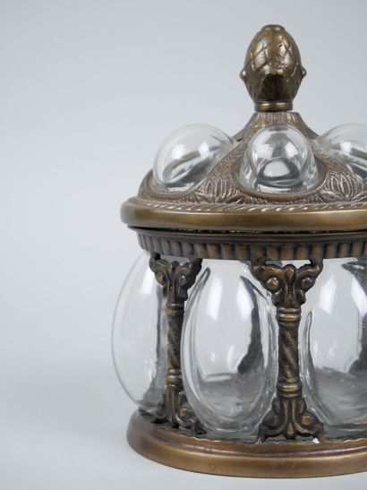 Oval blown-glass and metal cookie tin decorated...