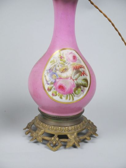 Pair of porcelain oil lamps with polychrome...