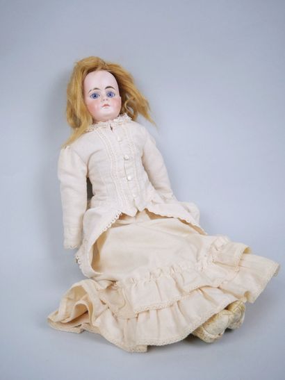 Porcelain head doll, fixed blue eyes, closed...