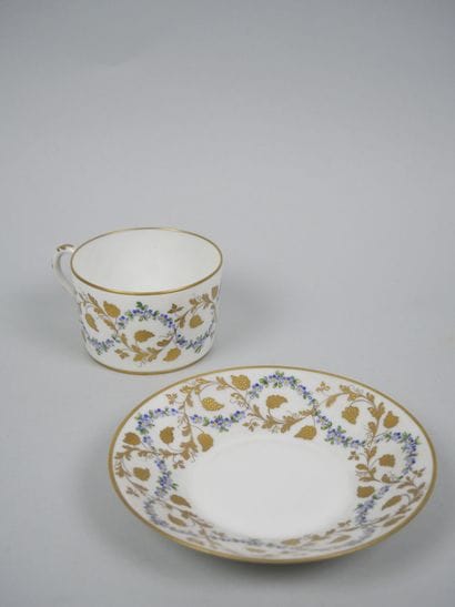 LE TALLEC 
Porcelain cup and saucer with...