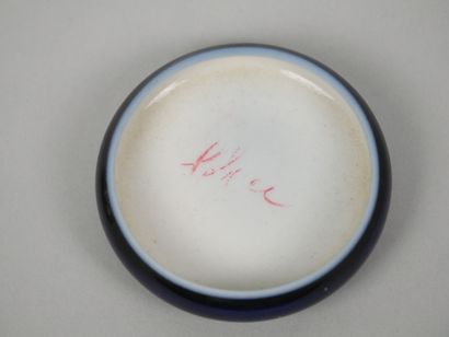 SEVRES
Reunion of 4 small blue porcelain...