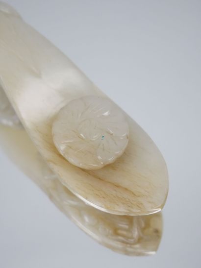 CHINA - 19th century
Celadon and brown-veined...