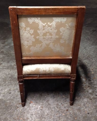 Moulded and carved natural wood armchair...