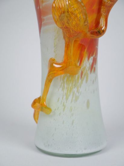 Orange-toned blown glass corolla vase decorated...