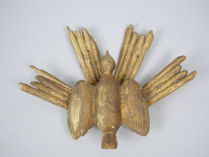 Reunion of two carved and gilded wood elements,...