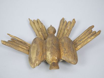 Reunion of two carved and gilded wood elements,...