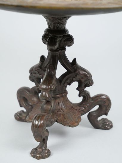 Bronze tripod bowl with relief decoration...