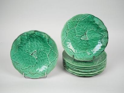 GIEN 
Suite of 10 green earthenware plates...