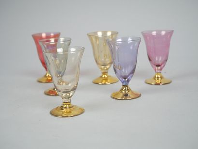 Part of a tinted and gilded glass service...