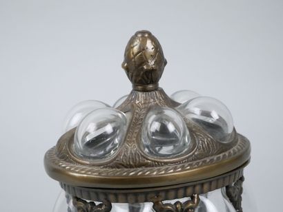 Oval blown-glass and metal cookie tin decorated...