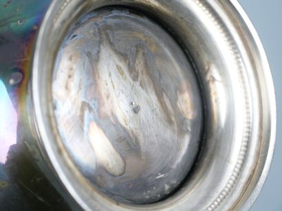 Part of a silver-plated tea service decorated...