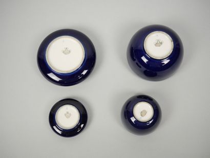 SEVRES
Reunion of 4 small blue porcelain...