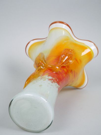 Orange-toned blown glass corolla vase decorated...