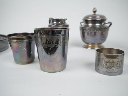 Part of a silver-plated tea service decorated...