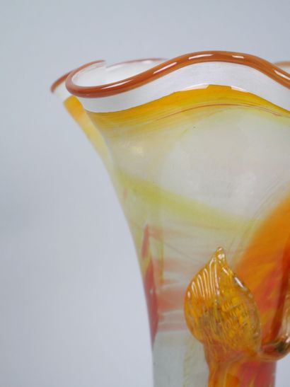 Orange-toned blown glass corolla vase decorated...