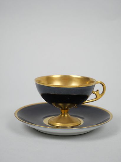 LIMOGES 
Set of three porcelain cups on pedestal...