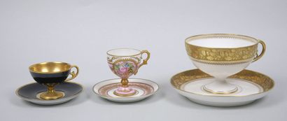 LIMOGES 
Set of three porcelain cups on pedestal...