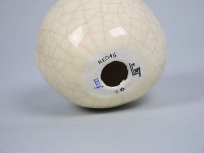 LONGWY 
Cracked earthenware apple with enameled...