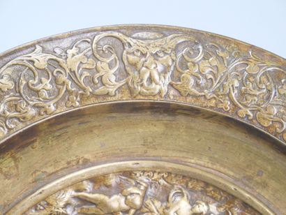 Bronze tripod bowl with relief decoration...