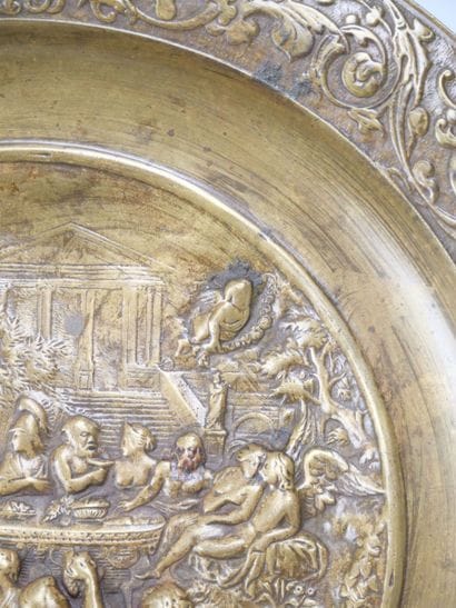 Bronze tripod bowl with relief decoration...