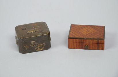 Reunion of two rectangular boxes, one in...