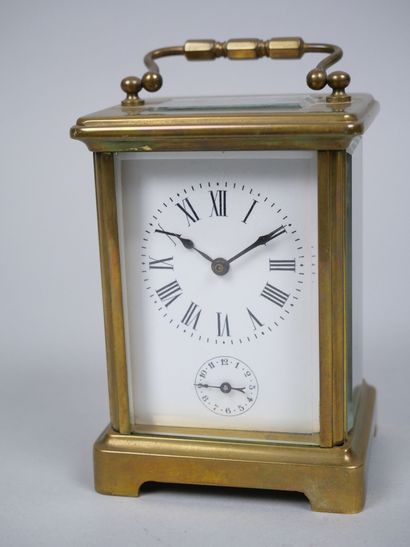 Officer's travel alarm clock with brass cage...