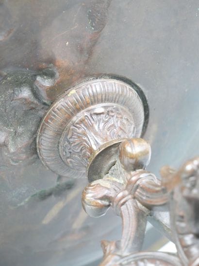 Bronze tripod bowl with relief decoration...