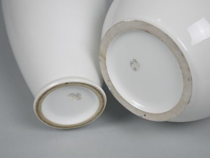 SEVRES
Set of two white porcelain vases,...