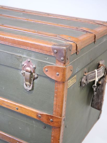 Travel trunk in studded leather, cardboard...