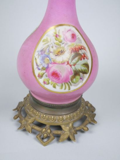 Pair of porcelain oil lamps with polychrome...