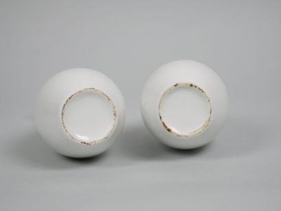 SEVRES
Pair of white porcelain baluster vases...