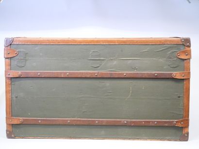 Travel trunk in studded leather, cardboard...