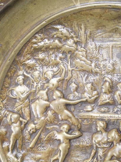 Bronze tripod bowl with relief decoration...