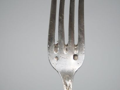 Silver flatware with ribbon and laurel leaf...