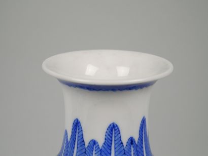 CHINA
Pair of baluster-shaped porcelain vases...