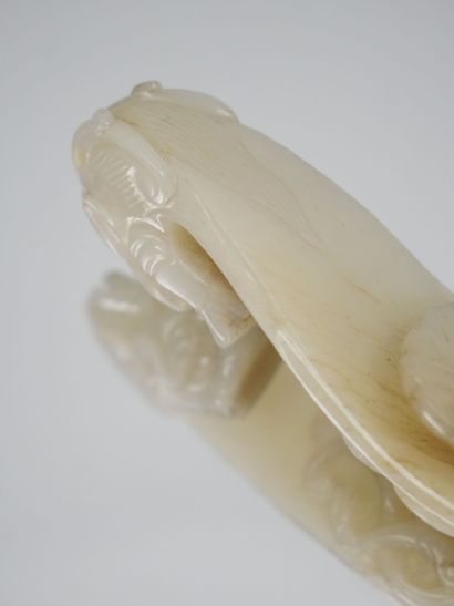 CHINA - 19th century
Celadon and brown-veined...