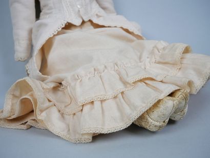 Porcelain head doll, fixed blue eyes, closed...