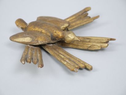 Reunion of two carved and gilded wood elements,...