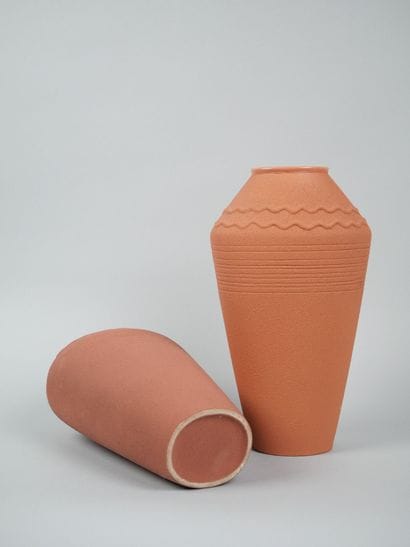 Reunion of two terra cota earthenware vases...