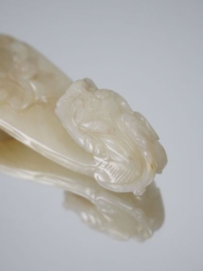 CHINA - 19th century
Celadon and brown-veined...