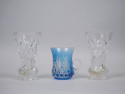 Meeting of two small cornet-shaped vases...
