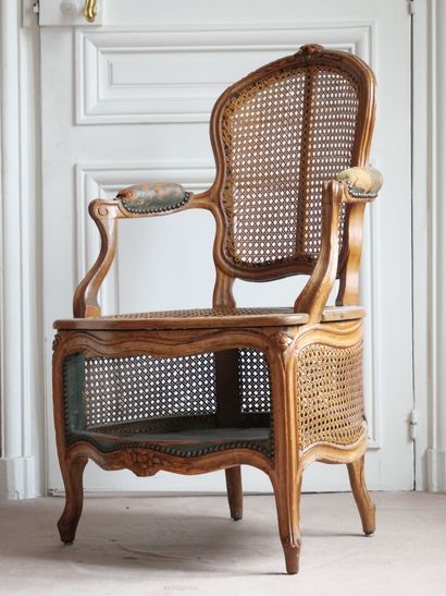 A molded and carved beechwood cabriolet-shaped...