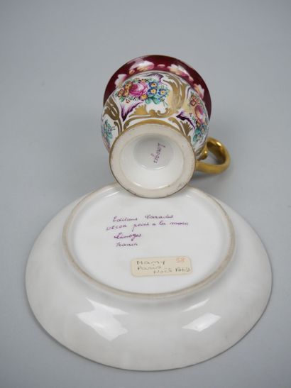 LIMOGES
Porcelain cup and saucer with polychrome...