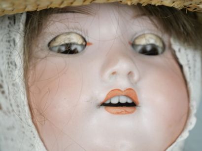 ARMAND MARSEILLE 
Porcelain-headed doll with...